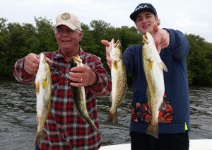 Mark and grandson Reilly with quality Spotted Sea Trout